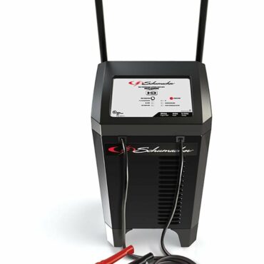 Schumacher Electric 200 amp 12 volt automatic battery charger and engine starter with wheels, long handle, and color-coded clamps.