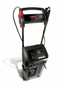 Schumacher Electric 275 amp 6 volt or 12 volt battery charger and engine starter with extra long handle, wheels, and color-coded clamps.